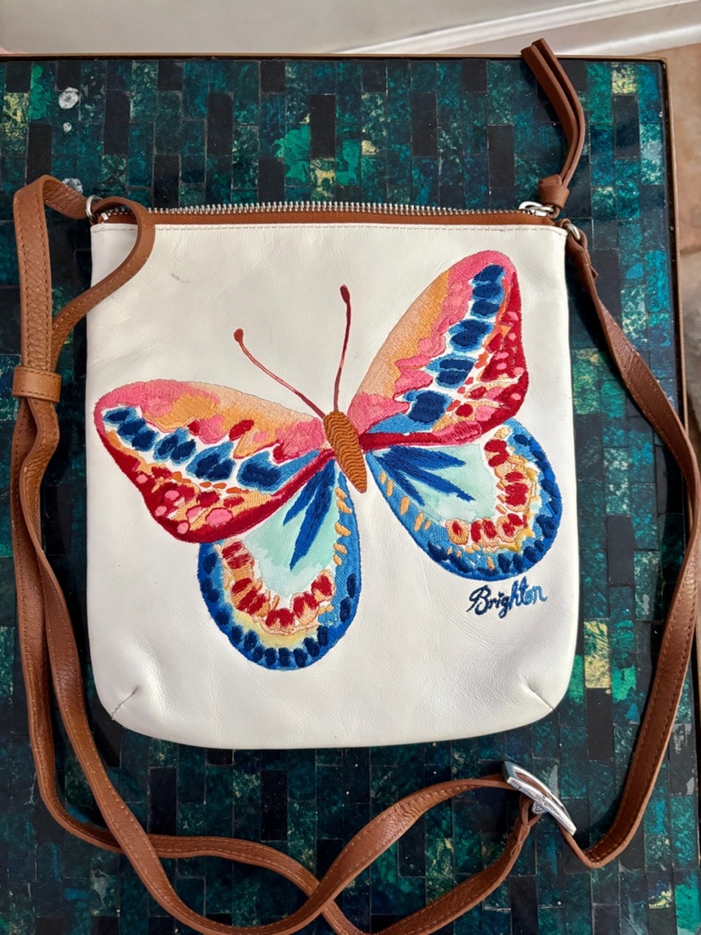 Brighton White Leather Crossbody with Colorful Butterfly Embroidery.
